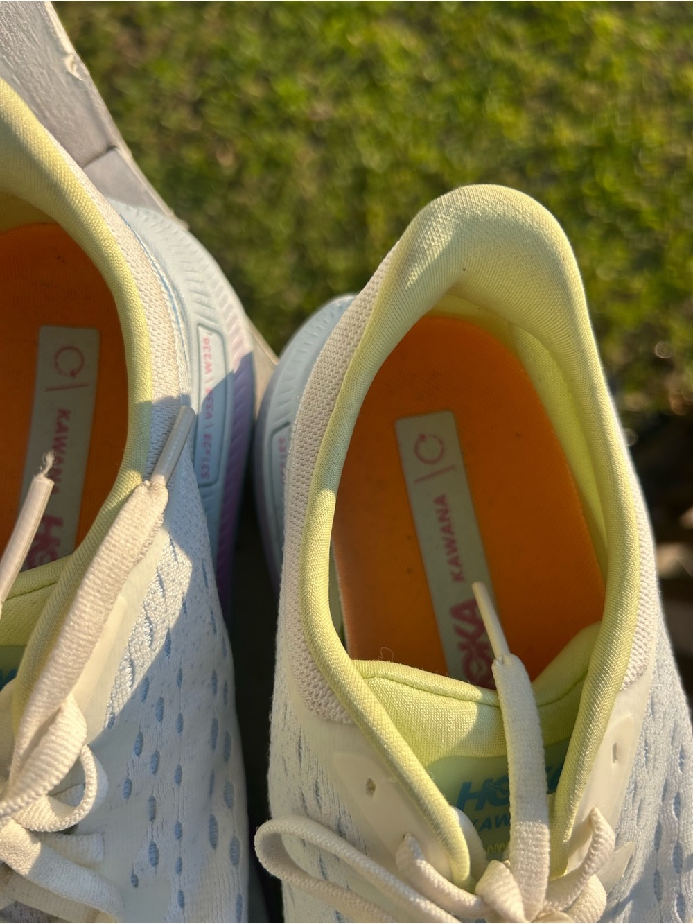 Hoka One One Women's White Running Shoes with Pastel Blue, Pink & Yellow Accents - Picture 3 of 11